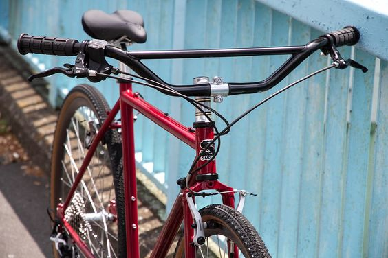 a red and black with Cruiser Bars